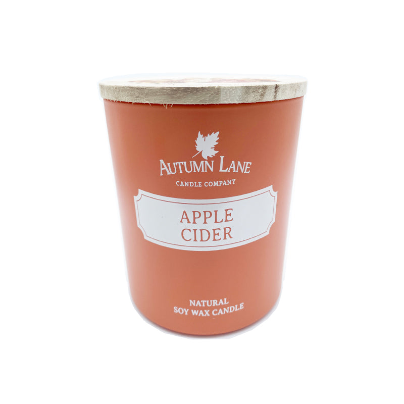 scented candle with fragrance of apple cider